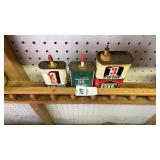 Lot of small oil tins