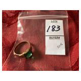 vintage-style ring features a square-cut green