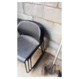 Chairs, Concrete Spikes and Metal