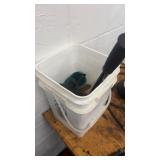 Bucket of Assorted Tools and Welding Goggles