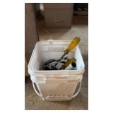 Bin of long screwdrivers and other tools