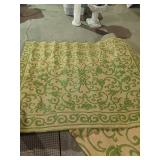 Tan and green exterior carpet 62'x81'
