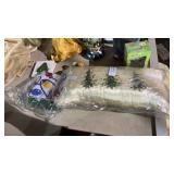 Assortment of Figurines, Neck Pillow, and Napkins
