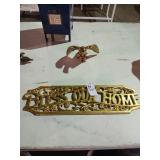 Brass eagle and brass painted sign