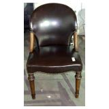 Vintage dark brown leather chair with nail head