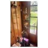 Vintage wrought iron corner shelf features a