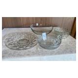 clear glass serving pieces and bowls