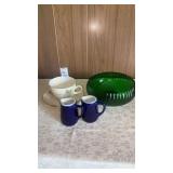 Ceramic cream pitchers, tea cup and saucer and