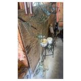 Antique-style wrought iron floor candle holder