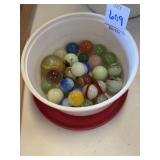 Lot of marbles and glass container