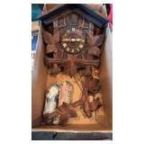 Traditional Black Forest wood cuckoo clock