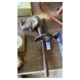 Antique cast iron eagle, tree root