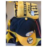 Steelers flag, hat, and terrible towels