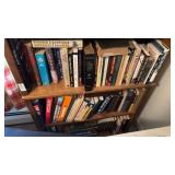Three Shelves of Assorted Books
