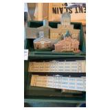 Wooden Somerset building figures with green dairy