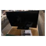 LG flat screen TV with remote and manual
