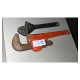 Pipe Wrench, Adjustable Wrench, and Folding Saw