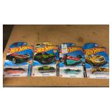 4 Hot wheels cars ï¿½ NIP
