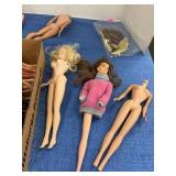 Lot of assorted Barbie doll heads and body parts