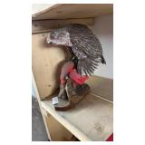 Hand-carved and painted wooden wildlife sculpture