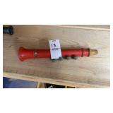 Vintage red painted wooden toy clarinet