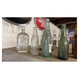 4 vintage beer bottles