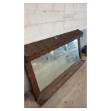 Vintage wooden display mirror with scalloped