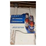 Labatt Blue Canadian Obsession metal beer sign