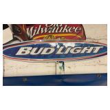 Vintage embossed metal Bud Light oval advertising