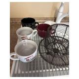 Lot of soup mugs, wire mug basket, and stoneware