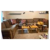 Sectional couch with recliners on both ends.