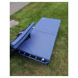 Folding bed with 2 cushions 30" wide, 69"