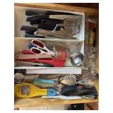 Drawer of assorted kitchen utensils
