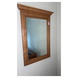 Wood framed wall mirror. 22 x 34