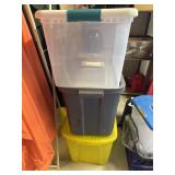 Three plastic storage totes with lids
