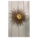 Seth Thomas MCM Sunburst wall clock. Wood