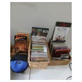 Lot of music cd's, Indiana Jones vhs tapes, some