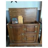 Wooden media console with misc items