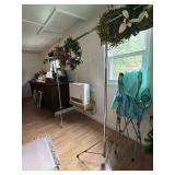 Metal rack, hangers, and wreaths