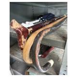 Shelf lot of 3 canes and an umbrella