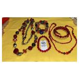 Shades of red bead necklaces & bracelets