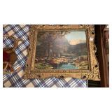 Vintage framed landscape painting of a serene