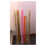 Lot of meter sticks and rulers