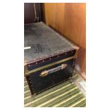 Vintage black metal storage trunk with brass