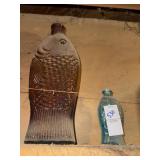 Vintage Fischï¿½s orange and teal fish bottles