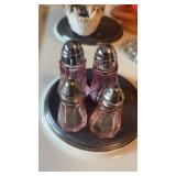Two Sets of Pink Salt and Pepper Shakers One is