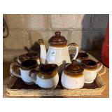 Vintage tricolor stoneware tea-set in basket