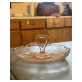 Vintage pink depression glass candy dish with