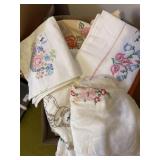 Box lot of vintage embroidered pillowcases