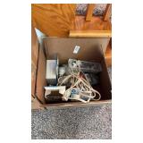 Box of light bulbs and electrical parts